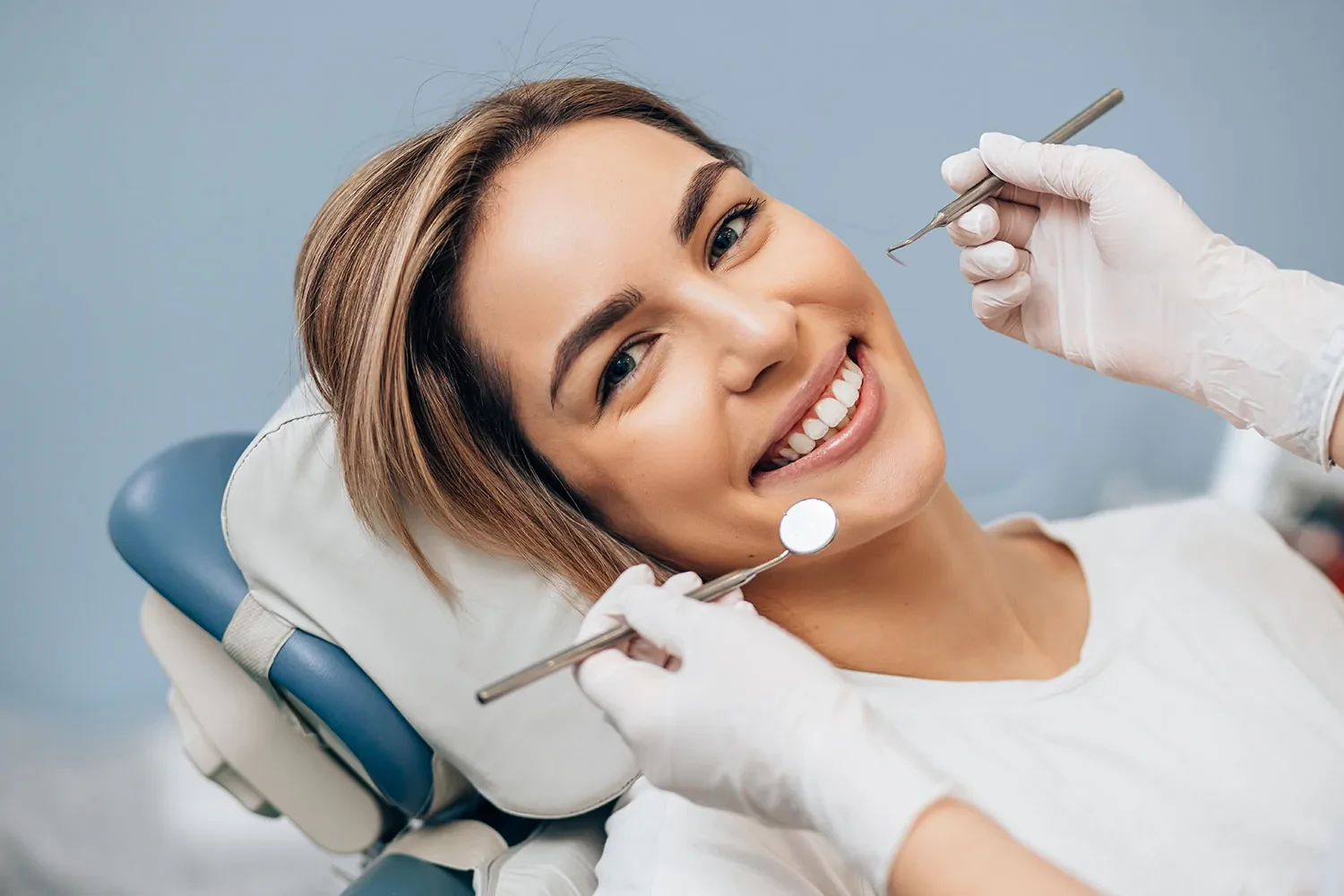 Dentist discussing sedation options with a nervous dental patient